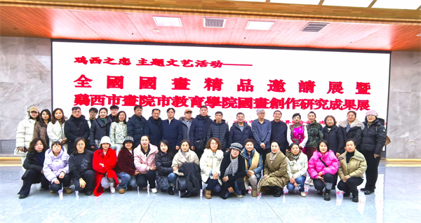 1、画展中教师团队集体合影.jpg